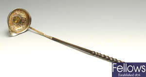A Georgian coin inset toddy ladle with baleen handle & a pair of mid-19th century fish servers.