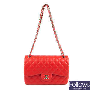 CHANEL - a red Jumbo Classic Double Flap handbag.