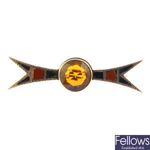 A citrine and hardstone brooch.