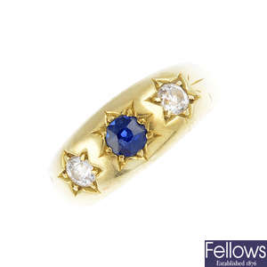 A late Victorian 18ct gold sapphire and diamond three-stone ring.