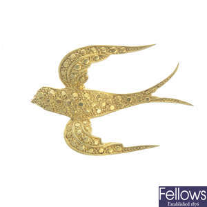 A swallow brooch.
