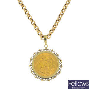 A 9ct gold half sovereign pendant, with chain.