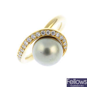 An 18ct gold cultured pearl and diamond dress ring.