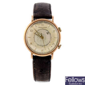 JAEGER-LECOULTRE - a gentleman's yellow metal Memovox wrist watch.