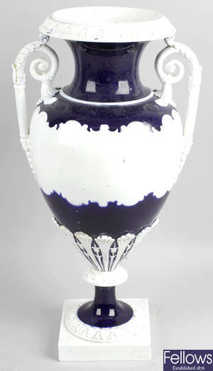 A Flight Barr & Barr Worcester porcelain vase, together with a replica animalier figure group of three horses.