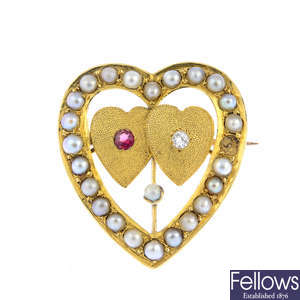 An early 20th century 18ct gold ruby, diamond and split pearl brooch.