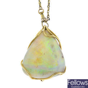 An 18ct gold opal pendant, with early 20th century chain.