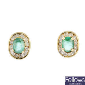 A pair of 18ct gold emerald and diamond cluster earrings and a 9ct gold brilliant-cut diamond single stud earring.