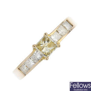A diamond and 'yellow' diamond dress ring.
