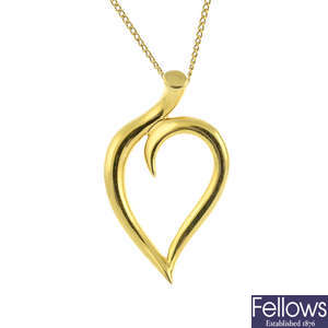 TIFFANY & CO. - an 18ct gold leaf pendant, with chain.