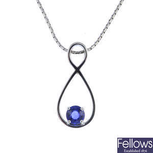 An 18ct gold sapphire pendant, with 18ct gold chain.