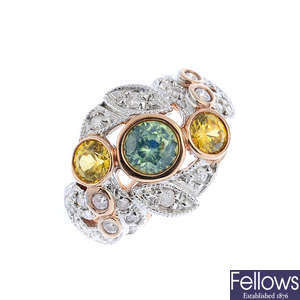 A 14ct gold diamond and gem-set cluster ring.