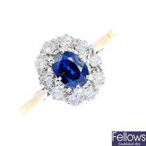 An 18ct gold and palladium sapphire and diamond cluster ring.