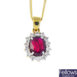 An 18ct gold ruby and diamond pendant, with chain.