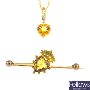 An early 20th century gold citrine brooch and a 9ct gold citrine and diamond pendant, with chain.