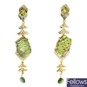 A pair of silver tourmaline and diamond earrings.