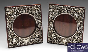 A pair of late Victorian silver mounted photograph frames.