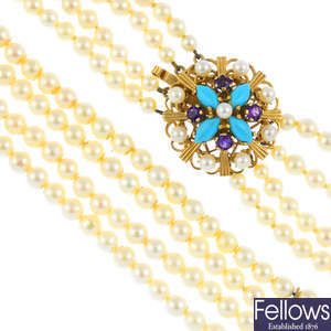 A 9ct gold cultured pearl four-row necklace, with gem-set clasp.