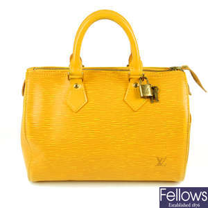 LOUIS VUITTON - a yellow Epi Speedy 25 handbag.
