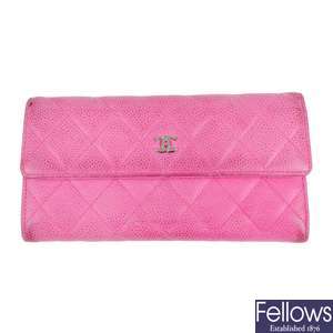 CHANEL - a pink Caviar Flap long wallet.