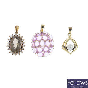A selection of gem-set pendants and earrings.