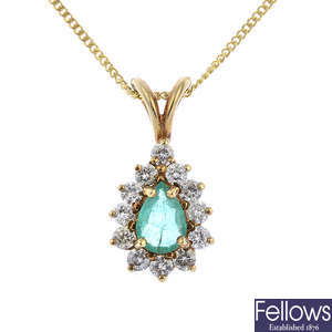 An emerald and diamond cluster pendant, with a 9ct gold chain.