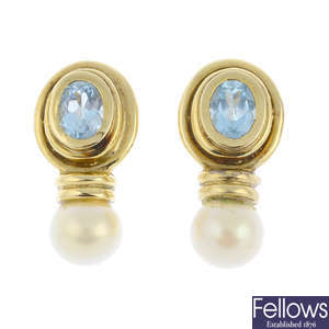 A pair of topaz and imitation pearl earrings.