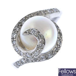 A platinum cultured pearl and diamond dress ring.