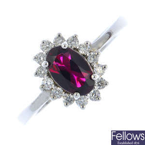 An 18ct gold tourmaline and diamond cluster ring.