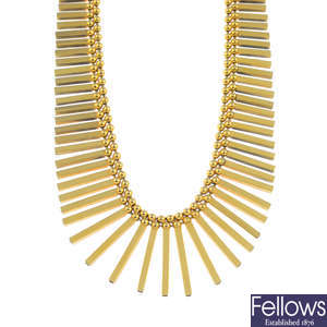 A 1970s 9ct gold fringe necklace.