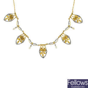 An early 20th century 18ct gold seed pearl and diamond necklace.