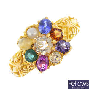 A late Victorian 18ct gold gem-set cluster ring.