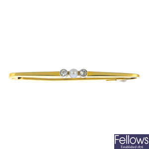 A seed pearl and diamond bar brooch.