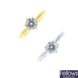 Two 18ct gold synthetic moissanite single-stone rings.