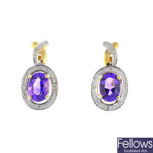 A pair of 9ct gold amethyst and diamond earrings.
