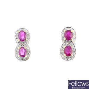 A pair of 9ct gold ruby and diamond cluster earrings.