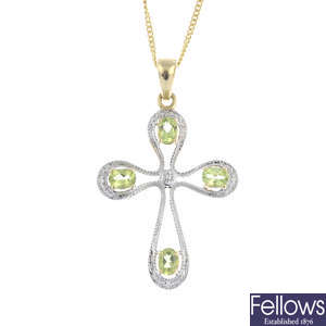 A 9ct gold peridot and diamond cross pendant., with chain.