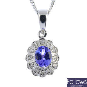 A tanzanite and diamond cluster pendant, with chain.
