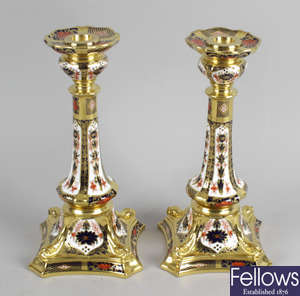 A pair of Royal Crown Derby Old Imari bone china candle sticks.