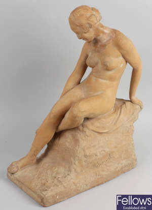 A terracotta figure.