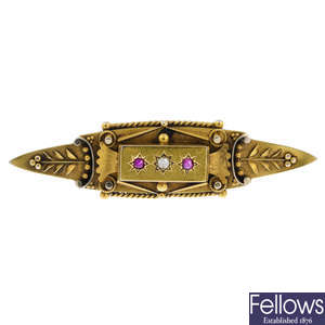 A late Victorian 15ct gold diamond and ruby brooch.