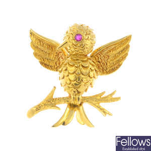 BOUCHERON - a 1960s 18ct gold ruby bird brooch.