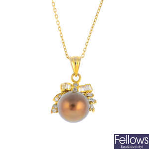 A 14ct gold cultured pearl and diamond pendant, with chain.