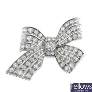 A mid 20th century diamond bow brooch.