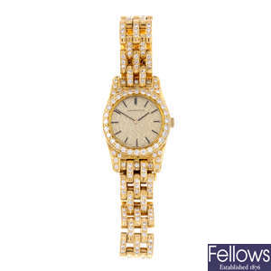 AUDEMARS PIGUET - a lady's 18ct yellow gold bracelet watch.