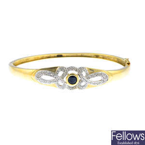 A 9ct gold sapphire and diamond bangle.