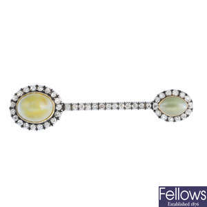A mid 19th century silver and gold, cat's-eye chrysoberyl and diamond brooch.