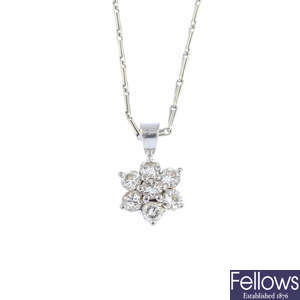 A diamond cluster pendant, with a 9ct gold chain.