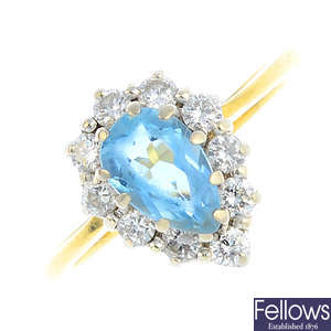An 18ct gold diamond and aquamarine cluster ring.