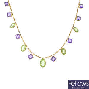 An early 20th century 15ct gold amethyst and peridot necklace.